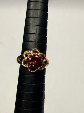 Gold Floral Ring with Deep Red Gemstone